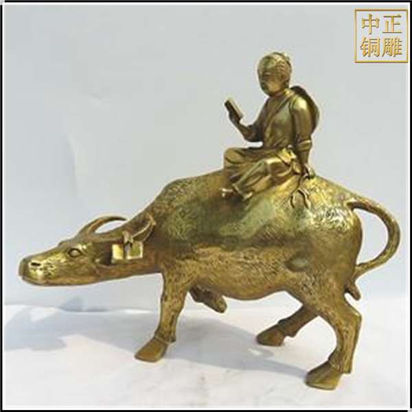 小孩騎牛圖片